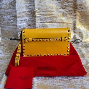 Valentino Garavani clutch/wristlet in mustard yellow